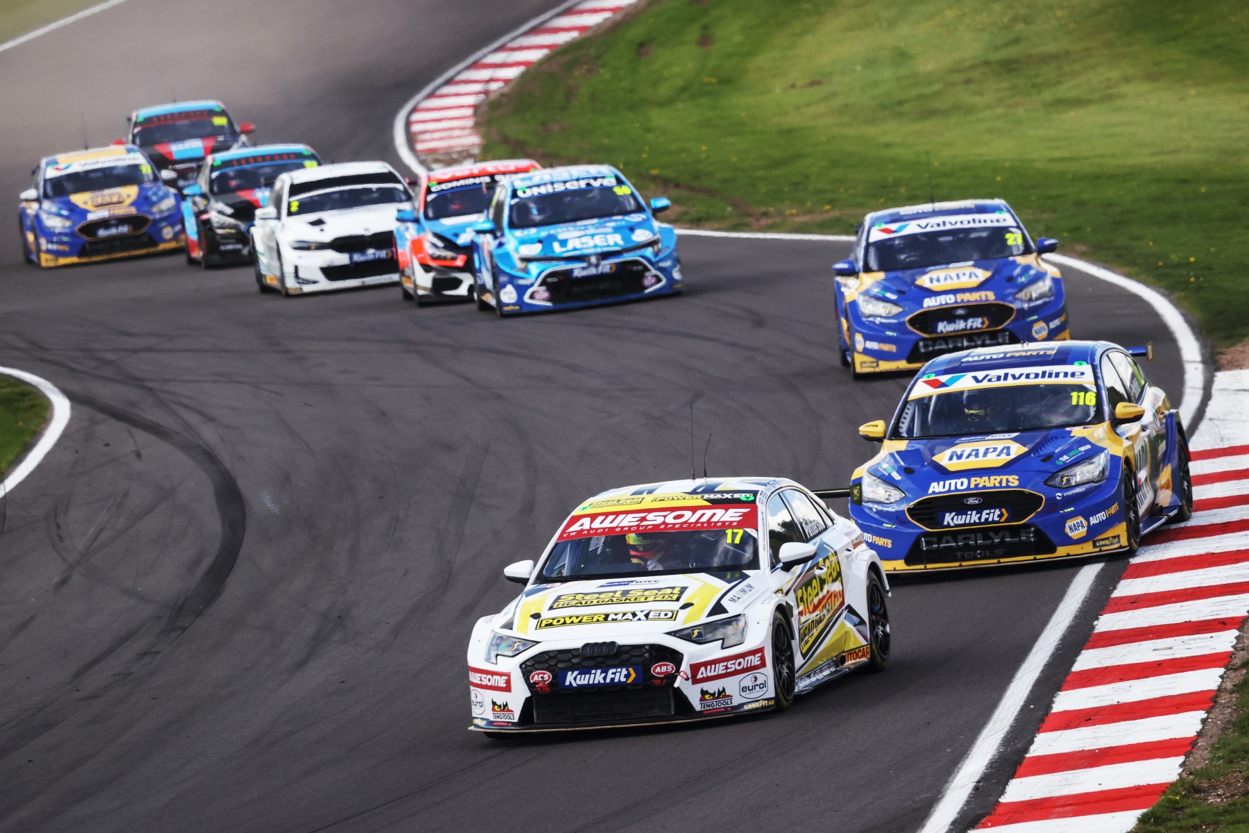 The #17 PMR Audi A3 leads a pack including the #116 NAPA Racing Ford Focus at Brands Hatch